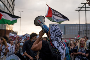 Pro-Palestinian protesters march with Palestinian flags while chanting during the demonstration. A nationwide strike was held all over Spain, with demonstration in all the main cities. More than 20.000 of pro-Palestinian protesters marched in Barcelona, with several clashes with police and episodes of looting and burning of dumpsters.