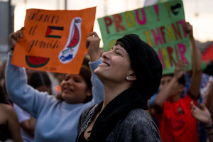 Pro-Palestinian protesters hold placards and chant slogans during the demonstration. A nationwide strike was held all over Spain, with demonstration in all the main cities. More than 20.000 of pro-Palestinian protesters marched in Barcelona, with several clashes with police and episodes of looting and burning of dumpsters.