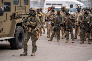 Police face off against demonstrators in front of the Broadview Immigration Detention Facility. A lawsuit filed October 30, 2025 alleges inhumane, degrading, and humiliating conditions in the facility with a lack of food, water, access to hygiene and medical care, or places to sleep.