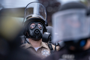 Police face off against demonstrators in front of the Broadview Immigration Detention Facility. A lawsuit filed October 30, 2025 alleges inhumane, degrading, and humiliating conditions in the facility with a lack of food, water, access to hygiene and medical care, or places to sleep.