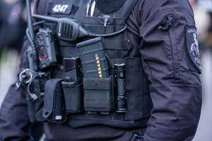 Police face off against demonstrators in front of the Broadview Immigration Detention Facility. A lawsuit filed October 30, 2025 alleges inhumane, degrading, and humiliating conditions in the facility with a lack of food, water, access to hygiene and medical care, or places to sleep.