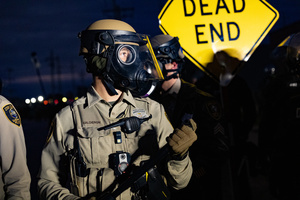 Police face off against demonstrators in front of the Broadview Immigration Detention Facility. A lawsuit filed October 30, 2025 alleges inhumane, degrading, and humiliating conditions in the facility with a lack of food, water, access to hygiene and medical care, or places to sleep.