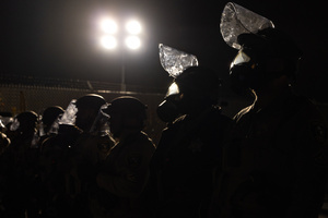Police face off against demonstrators in front of the Broadview Immigration Detention Facility. A lawsuit filed October 30, 2025 alleges inhumane, degrading, and humiliating conditions in the facility with a lack of food, water, access to hygiene and medical care, or places to sleep.
