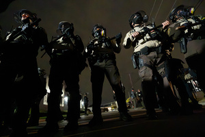 Police face off against demonstrators in front of the Broadview Immigration Detention Facility. A lawsuit filed October 30, 2025 alleges inhumane, degrading, and humiliating conditions in the facility with a lack of food, water, access to hygiene and medical care, or places to sleep.