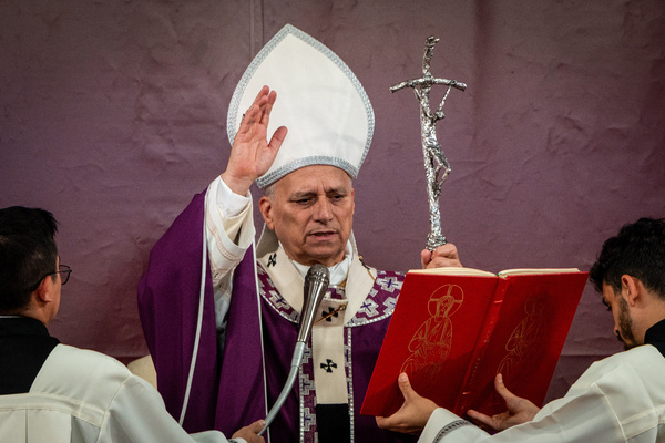 Pope Leo XIV delivers his blessing during the Mass on All Souls' Day inside the Verano Monumental Cemetery in Rome.