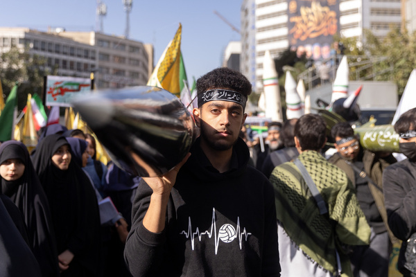 A protester carries a model of an Iranian-made missile during a rally marking the 46th anniversary of the U.S. Embassy takeover Iran marked the 46th anniversary of the 1979 U.S. embassy takeover, known as 13 Aban or Student Day, with state-organized rallies across the country, including a large march in Tehran from Palestine Square to the former U.S. Embassy. The demonstrations featured anti-U.S. and anti-Israel slogans, displays of ballistic missile and nuclear models, and effigies of Western leaders. In his address, Parliament Speaker Mohammad Baqer Qalibaf emphasized Iran’s independence and defiance against “Global Arrogance” amid heightened regional tensions.