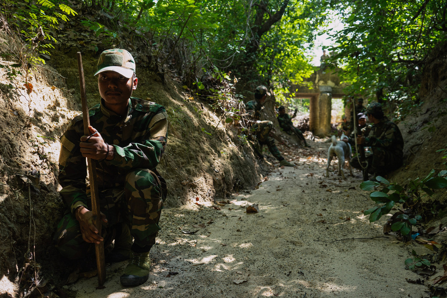 Soldiers from the Battalion 12 of the People's Defence Force (PDF) seen in Shwe Bo district during a patrol training exercise. The People's Defence Force (PDF) operates under the Ministry of Defence of the National Unity Government (NUG), a rival government. As of May 2025, the NUG claims to have formed over 300 PDF battalions.