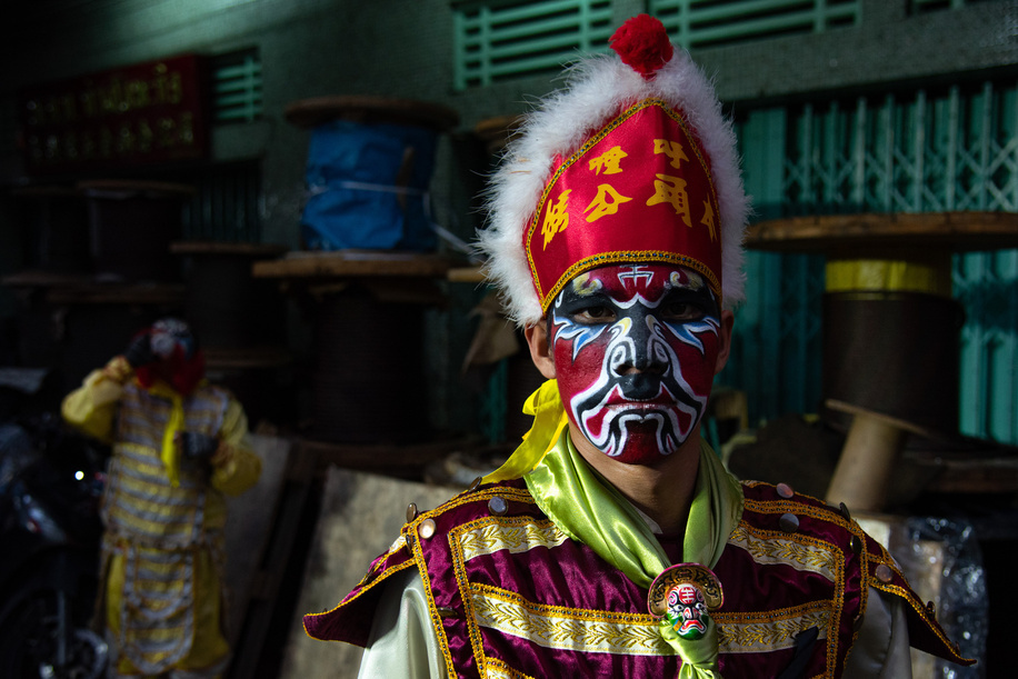 A dancer poses for a photo before performing the traditional Yingge dance during the Vegetarian festival at Chinatown in Bangkok. Yingge dance or Engkor, a form of Chinese folk dance, is popular in Teochew, a region in the east of Guangdong, China. The Yinnge dance combines martial arts, dramatic dance and is one of the most representative forms of folk arts in the Teochew region.