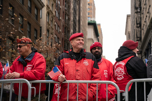 Curtis Sliwa makes his appearance during the 106th annual Veterans Day Parade in full Guardian Angels gear.