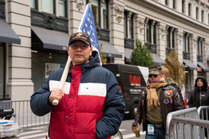 Veterans of the United States Armed Forces march, alongside family and friends during the 106th annual Veterans Day Parade.