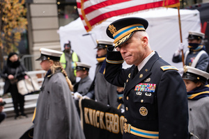 A colonel of the U.S. Army leads cadets during the 106th annual Veterans Day Parade.