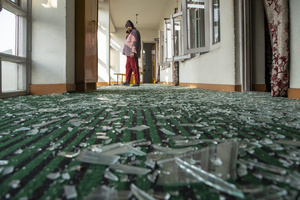 A man stands inside a nearby house covered with shattered glass after the explosion at the Nowgam police station in Srinagar. Nine people were killed and 32 others were injured in a major explosion inside a Police Station. Explosives reportedly detonated during a forensic investigation as part of a probe into an earlier blast in India’s capital, New Delhi, that killed 13 people and injured dozens.