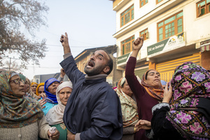 Kashmiri people mourn near the dead body of Muhammad Shafi, a civilian killed in an explosion inside a police station, during his funeral procession in Srinagar. Nine people were killed and 32 others were injured in a major explosion inside a Police Station. Explosives reportedly detonated during a forensic investigation as part of a probe into an earlier blast in India’s capital, New Delhi, that killed 13 people and injured dozens.