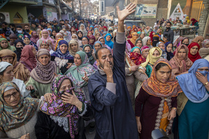 Kashmiri people mourn near the dead body of Muhammad Shafi, a civilian killed in an explosion inside a police station, during his funeral procession in Srinagar. Nine people were killed and 32 others were injured in a major explosion inside a Police Station. Explosives reportedly detonated during a forensic investigation as part of a probe into an earlier blast in India’s capital, New Delhi, that killed 13 people and injured dozens.