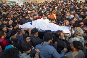 (EDITORS NOTE: Image depicts death) 
Kashmiri people carry the dead body of Muhammad Shafi, a civilian tailor killed in an explosion inside a police station, during his funeral procession in Srinagar. Nine people were killed and 32 others were injured in a major explosion inside a Police Station. Explosives reportedly detonated during a forensic investigation as part of a probe into an earlier blast in India’s capital, New Delhi, that killed 13 people and injured dozens.