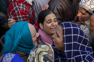 Relatives mourn near the dead body of Muhammad Shafi, a civilian tailor killed in an explosion inside a police station, during his funeral procession in Srinagar. Nine people were killed and 32 others were injured in a major explosion inside a Police Station. Explosives reportedly detonated during a forensic investigation as part of a probe into an earlier blast in India’s capital, New Delhi, that killed 13 people and injured dozens.