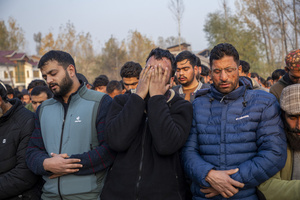 A relative mourns near the dead body of Muhammad Shafi, a civilian tailor killed in an explosion inside a police station, during his funeral procession in Srinagar. Nine people were killed and 32 others were injured in a major explosion inside a Police Station. Explosives reportedly detonated during a forensic investigation as part of a probe into an earlier blast in India’s capital, New Delhi, that killed 13 people and injured dozens.