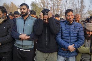 A relative mourns near the dead body of Muhammad Shafi, a civilian tailor killed in an explosion inside a police station, during his funeral procession in Srinagar. Nine people were killed and 32 others were injured in a major explosion inside a Police Station. Explosives reportedly detonated during a forensic investigation as part of a probe into an earlier blast in India’s capital, New Delhi, that killed 13 people and injured dozens.