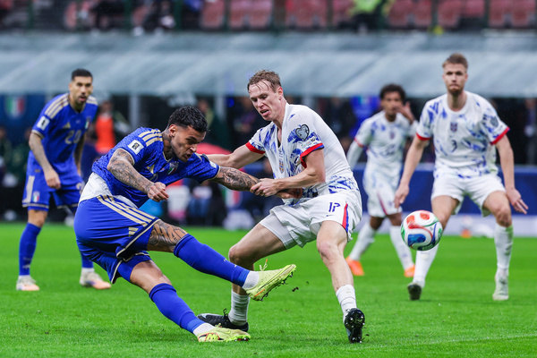 (L-R) Gianluca Scamacca of Italy seen in action with Torbjorn Heggem of Norway during FIFA World Cup 2026 qualifier football match between Italy and Norway at San Siro Stadium. Final score Italy 1 : 4 Norway