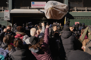 Immigration and Customs Enforcement (ICE) agents are confronted by protestors before an attempted sweep on Canal Street in Manhattan. ICE has cracked down on vendors selling counterfit goods in New York City.