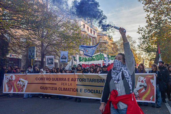 A banner is displayed during the USB (Unione Sindacale di Base) national demonstration against war policies and in support of Palestine.