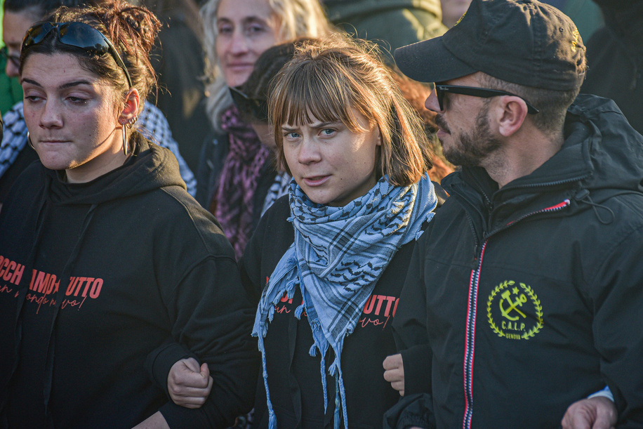 Climate activist and Global Sumud Flotilla member Greta Thunberg (C) attends during the USB (Unione Sindacale di Base) national demonstration against war policies and in support of Palestine.