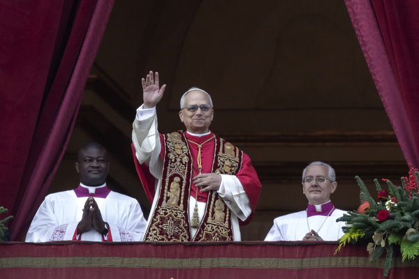 Pope Leo XIV seen delivering the Christmas Urbi et Orbi blessing to the city and to the world from the central loggia of St. Peter's Basilica .