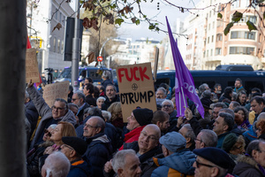 Protesters carry signs against the US and Donald Trump. During a rally organized by leftist groups in front of the US Embassy in Madrid to condemn the attacks carried out by the United States in Caracas in the early hours of January 3rd and the illegal arrest of President Nicolás Maduro and his transfer to a prison in New York along with his wife.