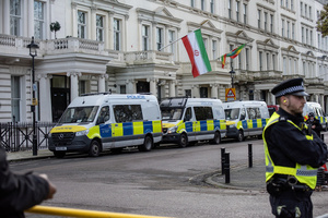 Police officers post outside the Iranian Embassy to protect the diplomats during the demonstration in London. Hundreds of Iranian royalists gathered outside the Iranian Embassy in London, UK. Protesters want to show their support to the anti-government protesters in Iran. Demonstrators intend to replace the Supreme Leader of Iran, Ayatollah Ali Khamenei, and his regime with the Crown Prince of Iran, Reza Pahlavi who lives in exile at the United States.