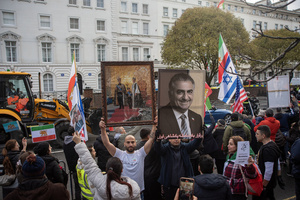 Protesters hold photos of the Iranian Shah's family (L) and the Crown Prince of Iran, Reza Pahlavi (R) during the demonstration outside the Iranian Embassy in London. Hundreds of Iranian royalists gathered outside the Iranian Embassy in London, UK. Protesters want to show their support to the anti-government protesters in Iran. Demonstrators intend to replace the Supreme Leader of Iran, Ayatollah Ali Khamenei, and his regime with the Crown Prince of Iran, Reza Pahlavi who lives in exile at the United States.