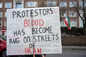 A protester holds a sign during the demonstration outside the Iranian Embassy in London. Hundreds of Iranian royalists gathered outside the Iranian Embassy in London, UK. Protesters want to show their support to the anti-government protesters in Iran. Demonstrators intend to replace the Supreme Leader of Iran, Ayatollah Ali Khamenei, and his regime with the Crown Prince of Iran, Reza Pahlavi who lives in exile at the United States.