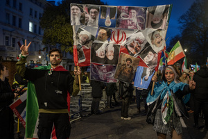 Protesters hold a banner with the Supreme Leader of Iran, Ayatollah Ali Khamenei during the demonstration outside the Iranian Embassy in London. Hundreds of Iranian royalists gathered outside the Iranian Embassy in London, UK. Protesters want to show their support to the anti-government protesters in Iran. Demonstrators intend to replace the Supreme Leader of Iran, Ayatollah Ali Khamenei, and his regime with the Crown Prince of Iran, Reza Pahlavi who lives in exile at the United States.