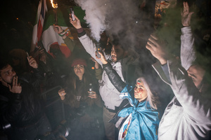 Protesters stand with flares during the demonstration outside the Iranian Embassy in London. Hundreds of Iranian royalists gathered outside the Iranian Embassy in London, UK. Protesters want to show their support to the anti-government protesters in Iran. Demonstrators intend to replace the Supreme Leader of Iran, Ayatollah Ali Khamenei, and his regime with the Crown Prince of Iran, Reza Pahlavi who lives in exile at the United States.