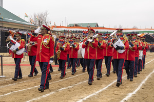 Border Security Force brass band contingents perform during the Republic Day parade in Kashmir. India is celebrating its 77th Republic Day, marking the anniversary of the adoption of the Constitution of India and the nation’s transformation into a republic on 26 January 1950.
