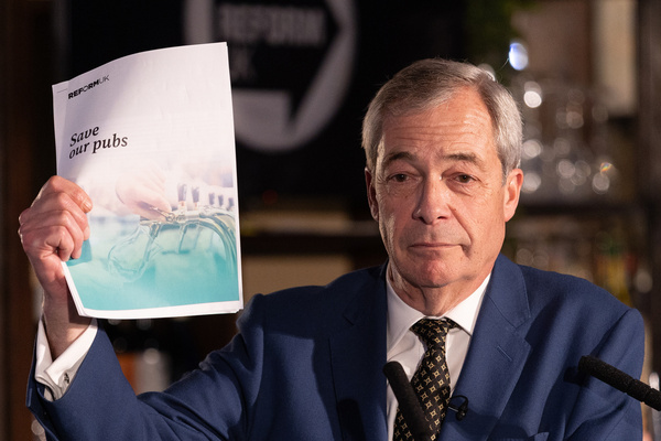 Nigel Farage, Leader of Reform UK, speaks at Reform UK press conference on their plan to cut taxes to save pubs and high streets at The Loose Box Pub in London.