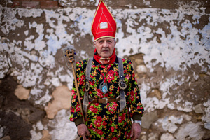 Natalio Sanchez, a member of the Endiablada brotherhood, poses in his costume, during the festival of La Endiablada in Almonacid del Marquesado. Celebrated in honor of the Virgin of Candelaria and Saint Blaise of Sebaste, La Endiablada is considered one of Spain’s oldest traditional festivals. During the event, men known as “the Devils,” dressed in colorful costumes with cowbells around their waists, jump and dance through the streets while carrying the statue of the saint in a lively procession.