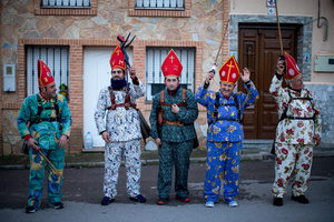 Members of the Endiablada brotherhood raise their clubs during the festival of La Endiablada in Almonacid del Marquesado. Celebrated in honor of the Virgin of Candelaria and Saint Blaise of Sebaste, La Endiablada is considered one of Spain’s oldest traditional festivals. During the event, men known as “the Devils,” dressed in colorful costumes with cowbells around their waists, jump and dance through the streets while carrying the statue of the saint in a lively procession.
