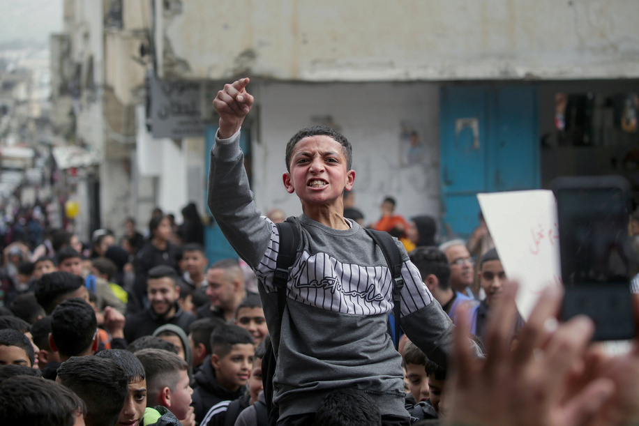 A Palestinian child from UNRWA school shouts slogans during the demonstration in Balata refugee camp, east of Nablus in the West Bank, protesting UNRWA's reduction of education and health services and the cutting of salaries of its employees in refugee camps in the West Bank.