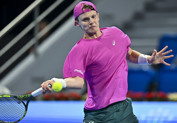 Jesper de Jong of the Netherlands plays against Andrey Rublev of Russia (not in view) during their men's singles round of 32 match at the ATP Qatar Exxonmobil Open 2026 tennis tournament at the Khalifa International Tennis Complex. Jesper de Jong won against Andrey Rublev 6-4,6-3.  