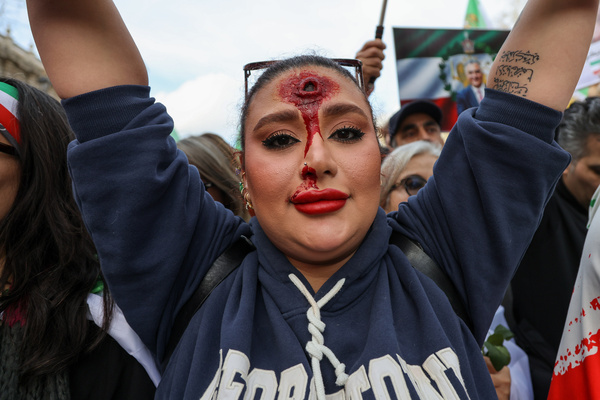 An Iranian protester with fake gun shots and blood on her face seen during a rally outside Downing Street. Protesters urged the UK government to support human rights and designate Iran’s Islamic Revolutionary Guard Corps (IRGC) as a terrorist organisation. Hundreds of people have reportedly been killed and thousands detained during unrest against the rule of Supreme Leader Ali Khamenei.