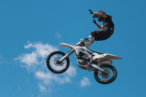 Motorcycle racers seen doing performance during the Moscow Sports day
at Luzhniki Stadium. Moscow Sports Day is a traditional festival of sports and activities. In 2025 Motorcycle racers from FMX13 Team (ProFMX Russia Team) performed at the Luzhniki Open Stadium.
