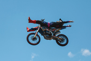 Motorcycle racers seen doing performance during the Moscow Sports day
at Luzhniki Stadium. Moscow Sports Day is a traditional festival of sports and activities. In 2025 Motorcycle racers from FMX13 Team (ProFMX Russia Team) performed at the Luzhniki Open Stadium.