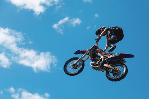 Motorcycle racers seen doing performance during the Moscow Sports day
at Luzhniki Stadium. Moscow Sports Day is a traditional festival of sports and activities. In 2025 Motorcycle racers from FMX13 Team (ProFMX Russia Team) performed at the Luzhniki Open Stadium.