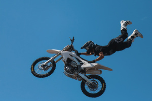 Motorcycle racers seen doing performance during the Moscow Sports day
at Luzhniki Stadium. Moscow Sports Day is a traditional festival of sports and activities. In 2025 Motorcycle racers from FMX13 Team (ProFMX Russia Team) performed at the Luzhniki Open Stadium.