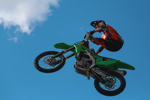 Motorcycle racers seen doing performance during the Moscow Sports day
at Luzhniki Stadium. Moscow Sports Day is a traditional festival of sports and activities. In 2025 Motorcycle racers from FMX13 Team (ProFMX Russia Team) performed at the Luzhniki Open Stadium.