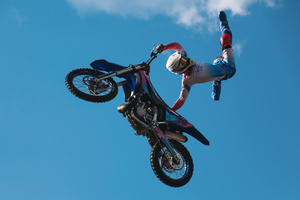 Motorcycle racers seen doing performance during the Moscow Sports day
at Luzhniki Stadium. Moscow Sports Day is a traditional festival of sports and activities. In 2025 Motorcycle racers from FMX13 Team (ProFMX Russia Team) performed at the Luzhniki Open Stadium.