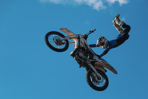 Motorcycle racers seen doing performance during the Moscow Sports day
at Luzhniki Stadium. Moscow Sports Day is a traditional festival of sports and activities. In 2025 Motorcycle racers from FMX13 Team (ProFMX Russia Team) performed at the Luzhniki Open Stadium.