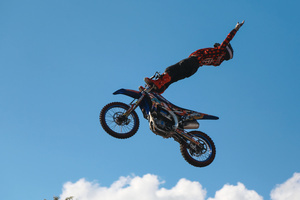 Motorcycle racers seen doing performance during the Moscow Sports day
at Luzhniki Stadium. Moscow Sports Day is a traditional festival of sports and activities. In 2025 Motorcycle racers from FMX13 Team (ProFMX Russia Team) performed at the Luzhniki Open Stadium.