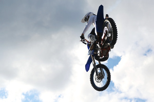 Motorcycle racers seen doing performance during the Moscow Sports day
at Luzhniki Stadium. Moscow Sports Day is a traditional festival of sports and activities. In 2025 Motorcycle racers from FMX13 Team (ProFMX Russia Team) performed at the Luzhniki Open Stadium.