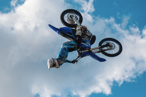 Motorcycle racers seen doing performance during the Moscow Sports day
at Luzhniki Stadium. Moscow Sports Day is a traditional festival of sports and activities. In 2025 Motorcycle racers from FMX13 Team (ProFMX Russia Team) performed at the Luzhniki Open Stadium.